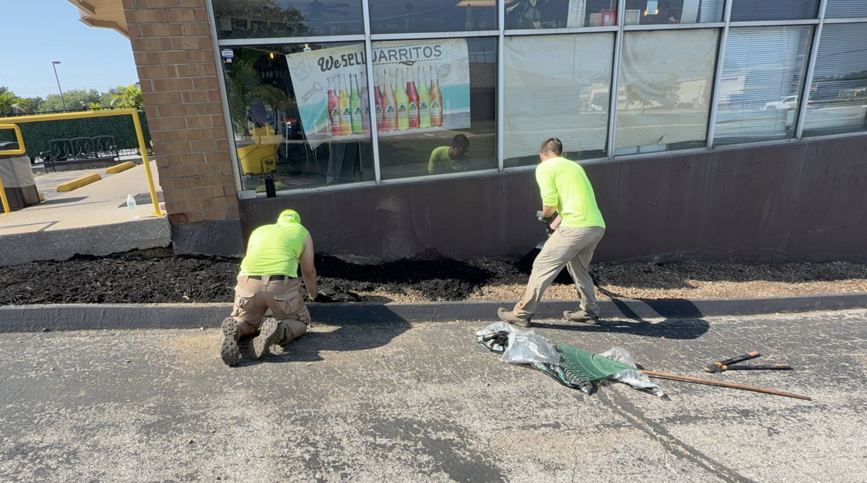 Fresh mulch installation in landscape beds in St. Peters