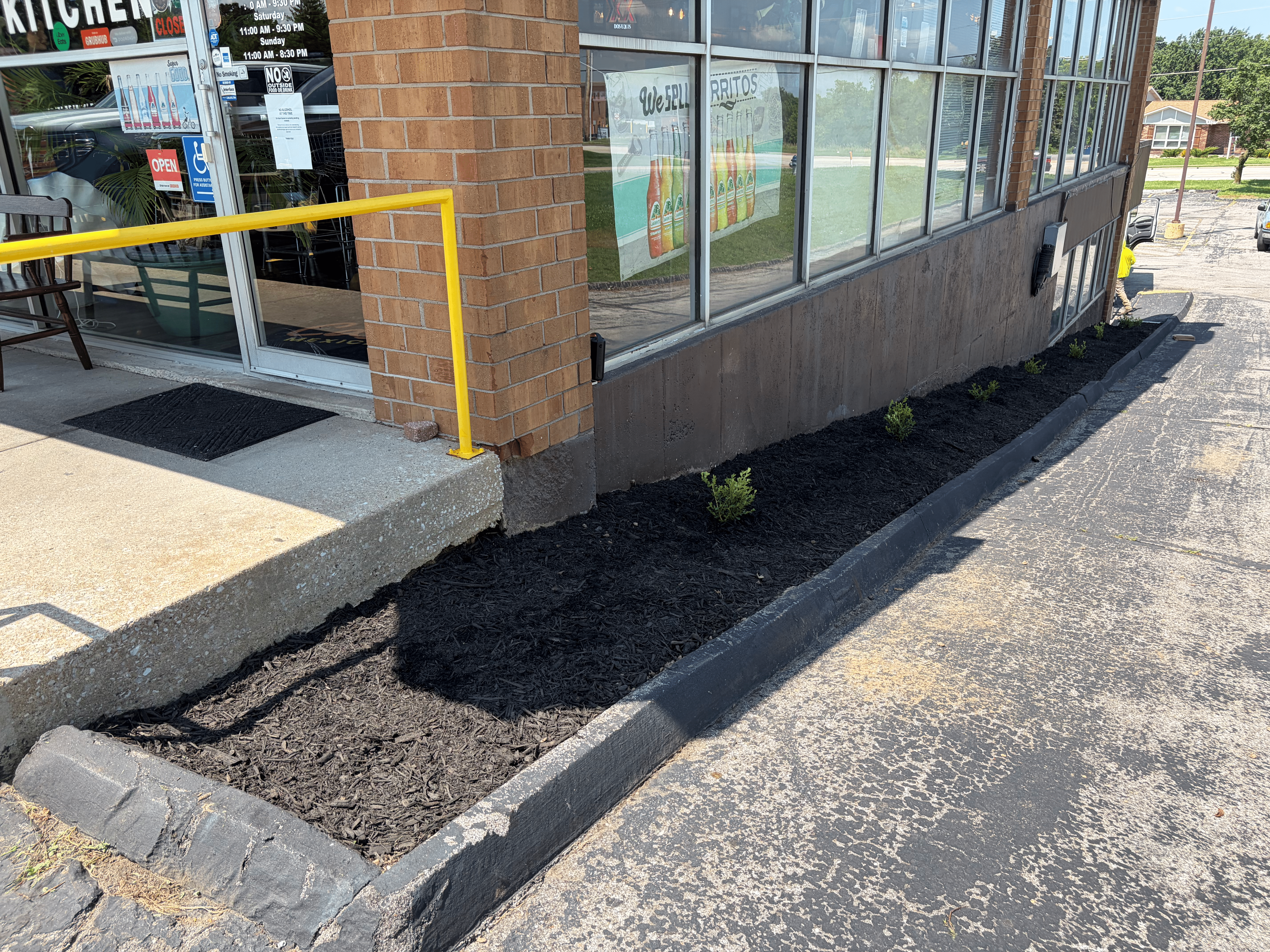 Fresh mulch installed in landscape beds in St. Peters